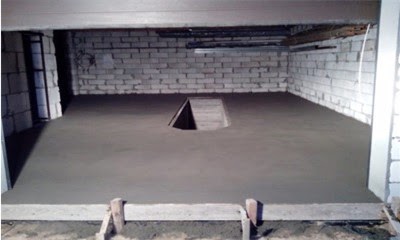 Какими должны быть слои и толщина бетонного пола в гараже?